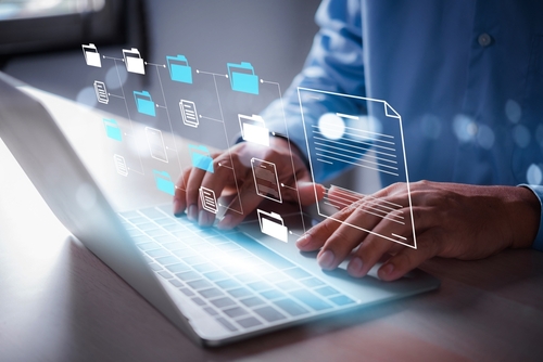 Business,Man,Using,Laptop,Access,Files,Document,On,Viritual,Screen,